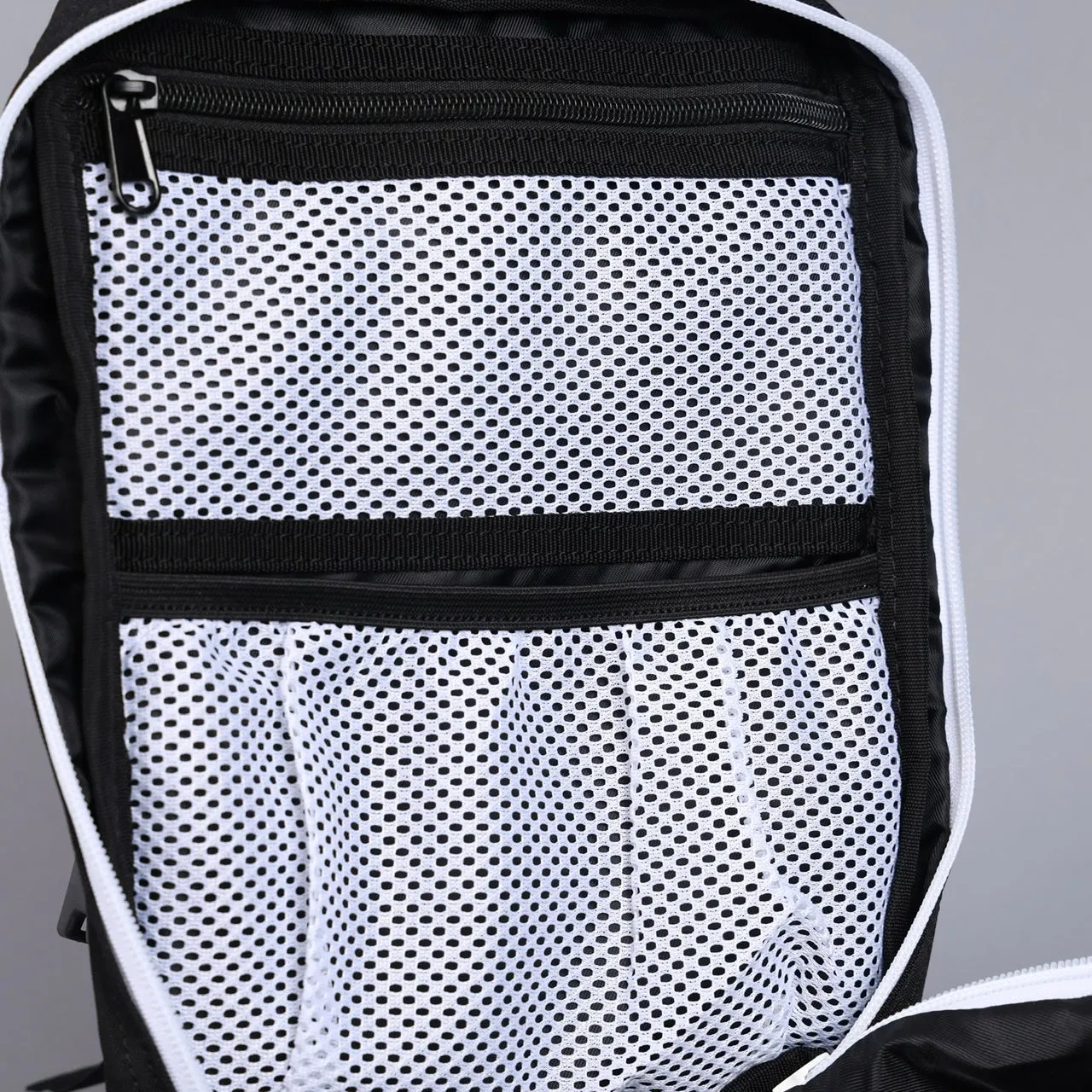 9L Backpack Mini Alpha Black White Accents